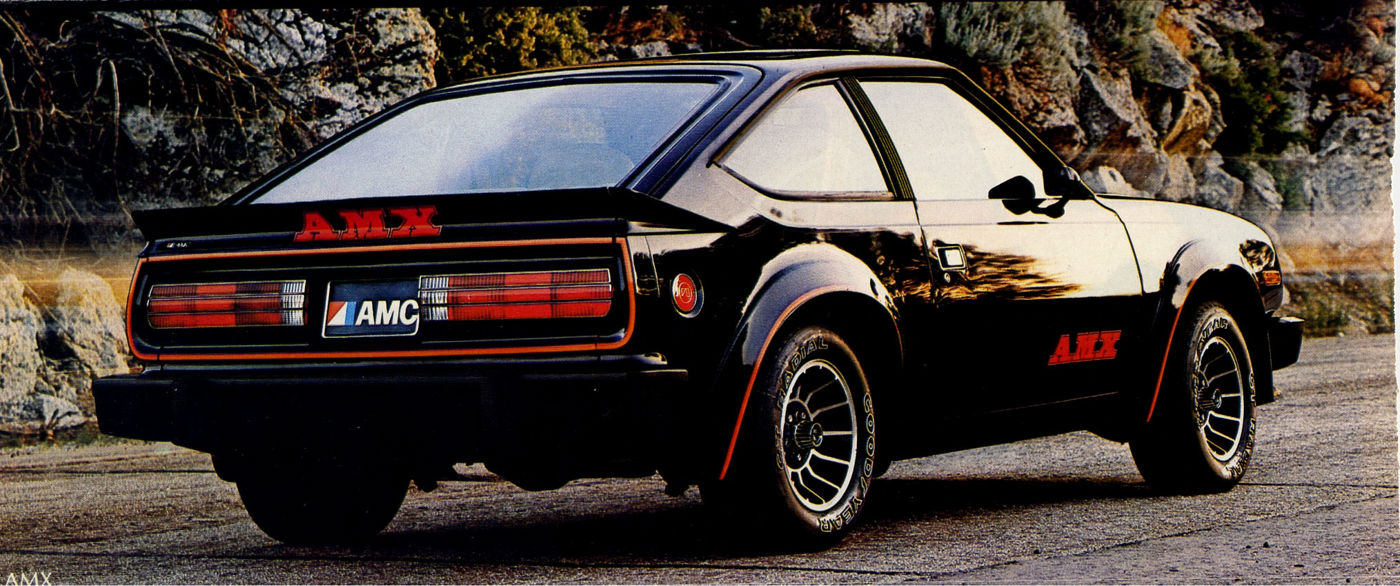 Brochure photo of a black 1979 AMC Spirit AMX from the rear three-quarter, with red AMX decals and flares