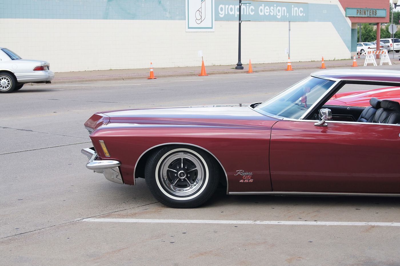 Maroon 1971 Buick Riviera GS boattail, front three-quarter, with GS fender badge