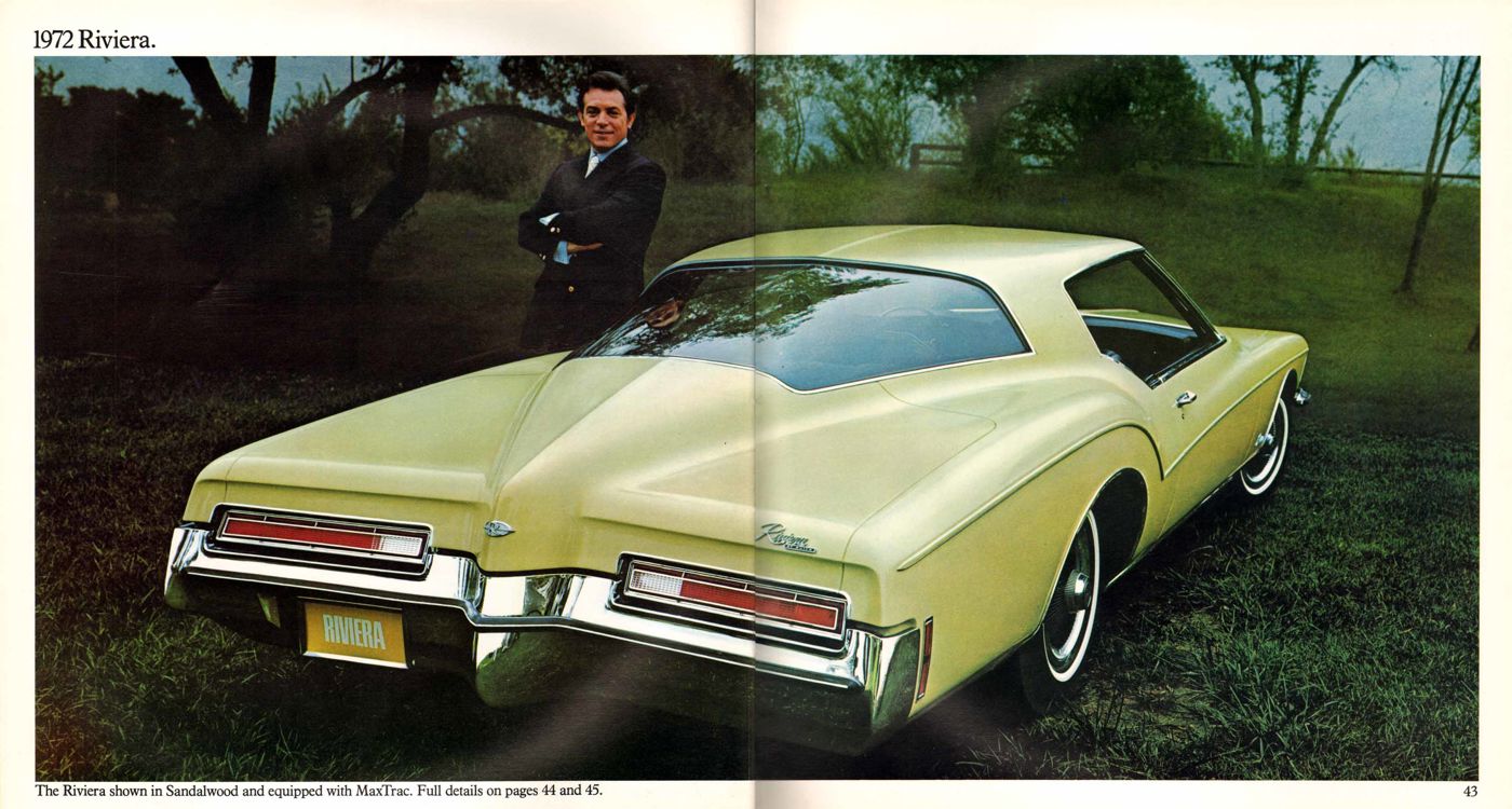 Brochure spread: pale green-gold 1972 Riviera boattail from the rear three-quarter with a man standing beside it