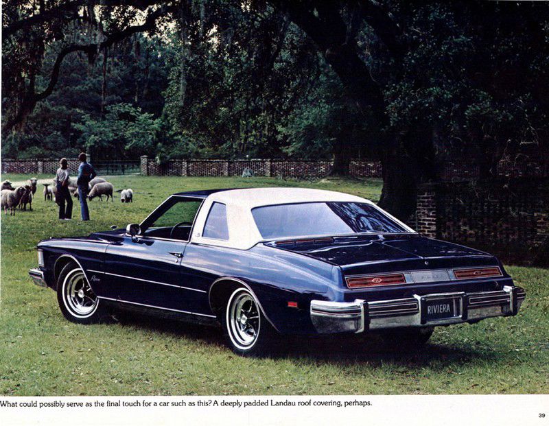 Brochure page: dark-blue 1975 Riviera with white Landau roof, rear three-quarter, on a lawn with sheep