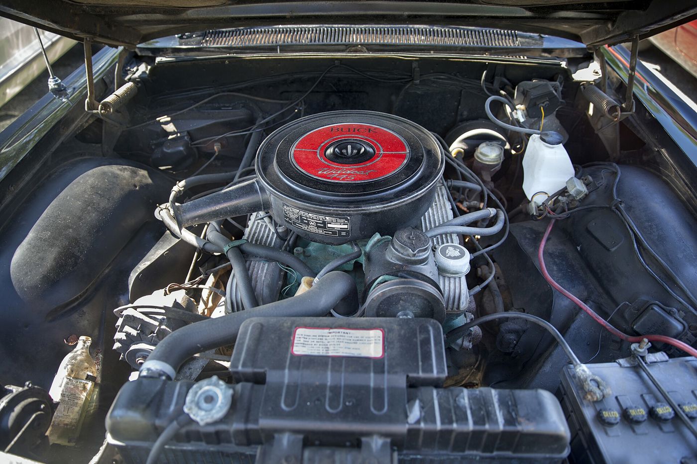 Engine bay of a 1964 Buick Wildcat with the round Wildcat 445 air cleaner