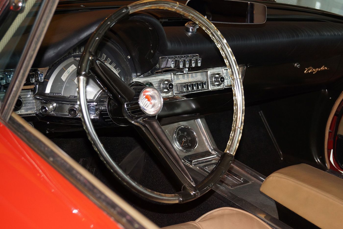 Driver's view of a 1961 Chrysler 300G: large steering wheel, Astra-Dome style gauges and push-button controls