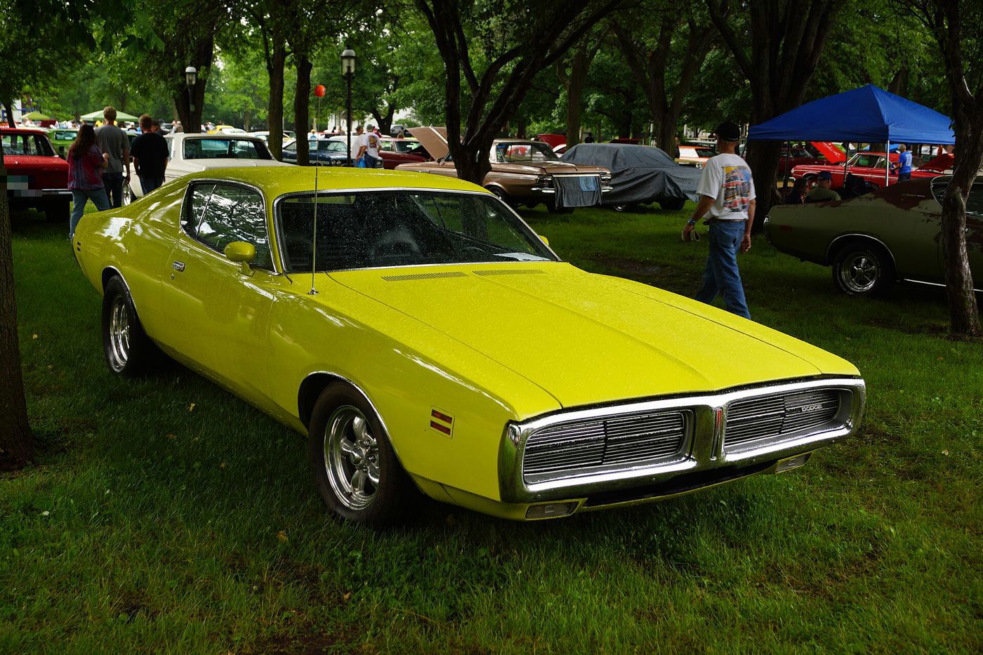 Yellow-green 1971 Dodge Charger from the front three-quarter showing the new fuselage body and split grille