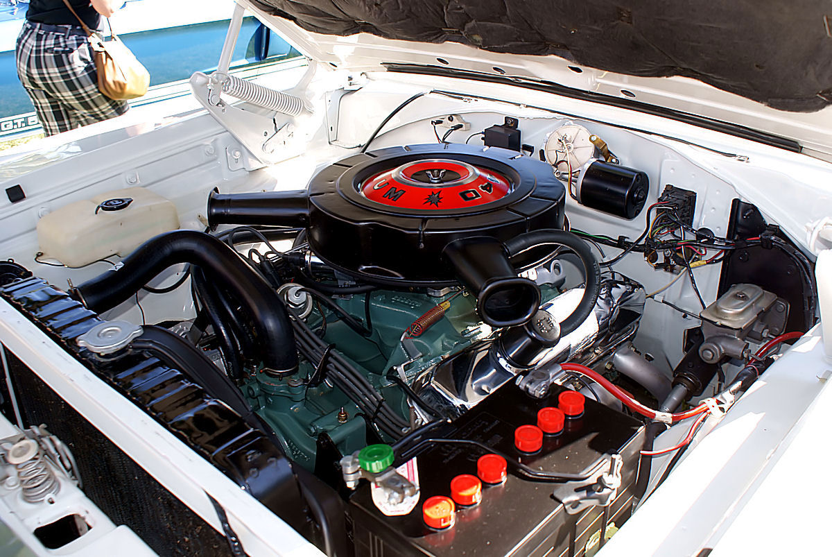 Engine bay of a white 1967 Dodge Coronet R/T with the 440 Magnum air cleaner lid