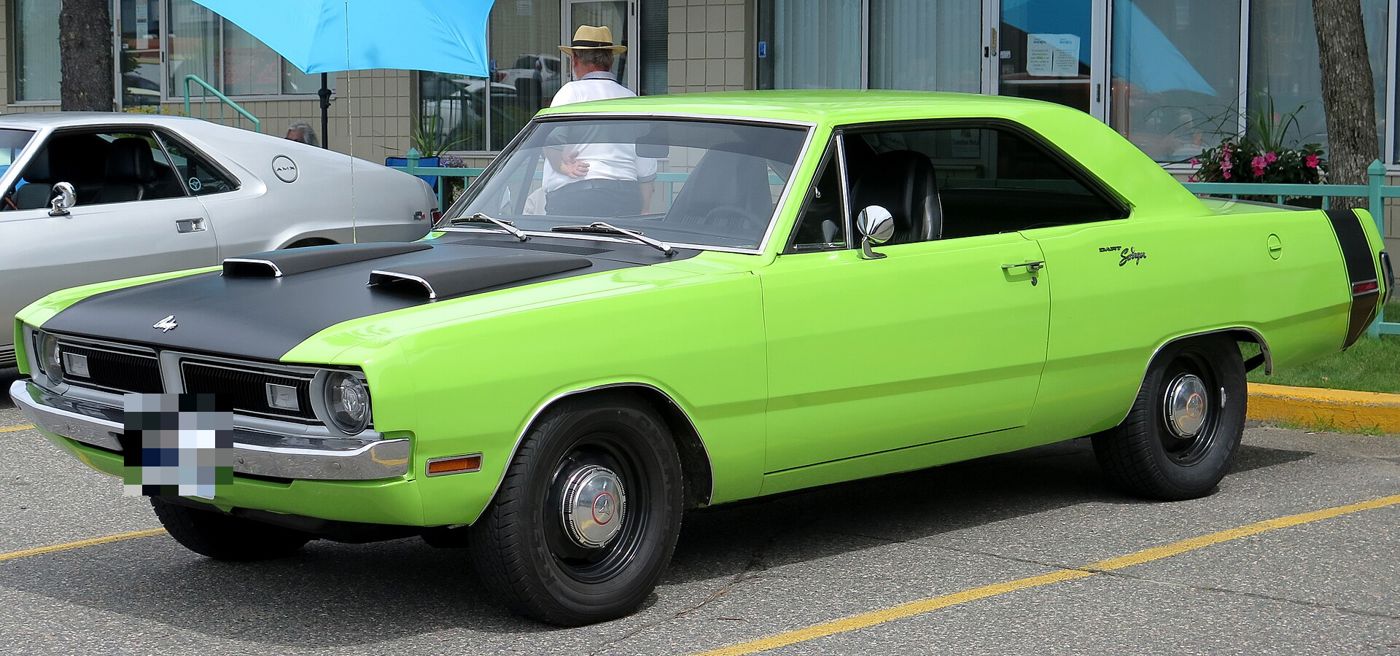 Sublime green 1970 Dodge Dart Swinger with black hood and twin hood scoops, front three-quarter
