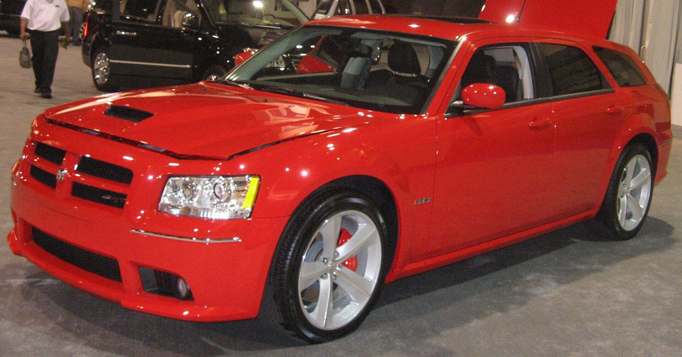 Red 2008 Dodge Magnum SRT8 at an auto show, with the revised 2008 grille, headlamps and hood scoop