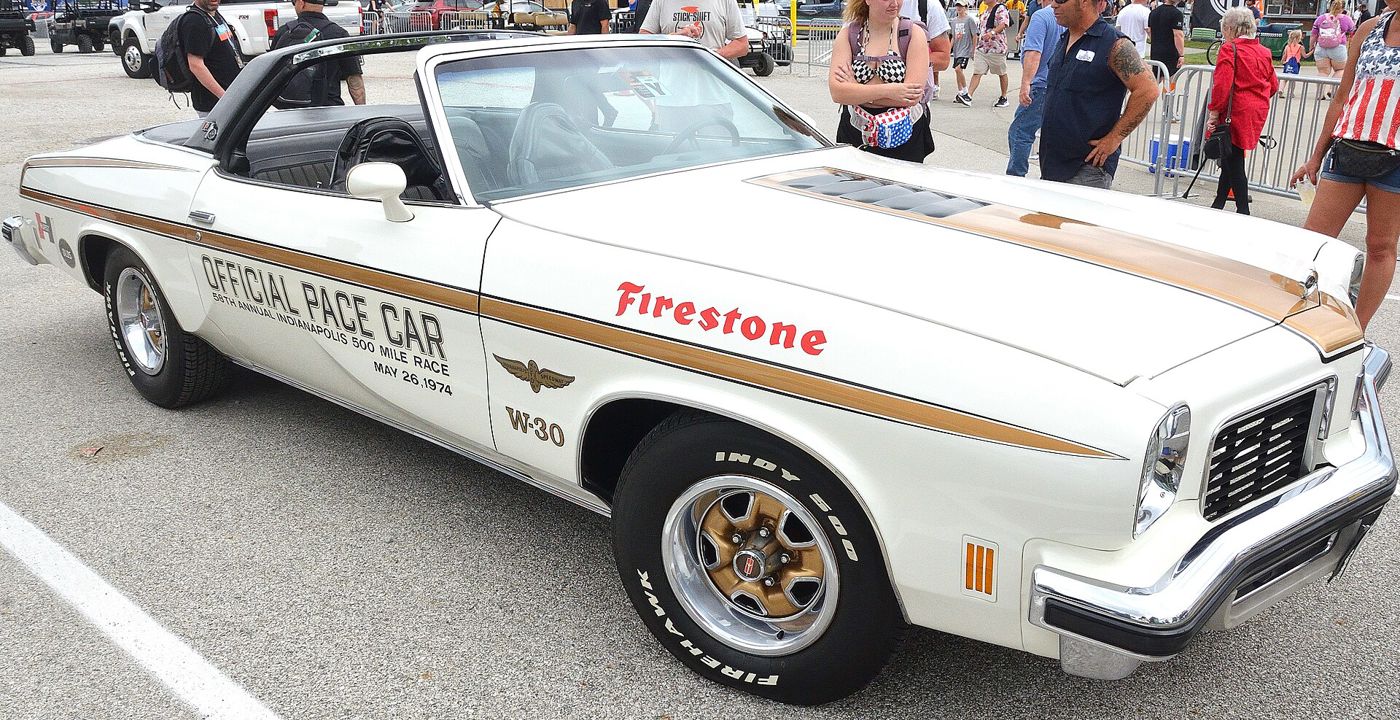 White and gold 1974 Hurst/Olds W-30 convertible-style pace car with Official Pace Car and Firestone lettering