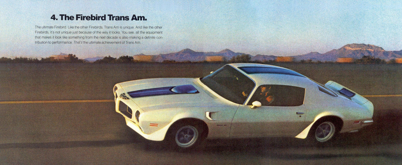 White 1970 Firebird Trans Am with a blue stripe, air dam and rear spoiler, driving on a desert road, under the heading 4. The Firebird Trans Am