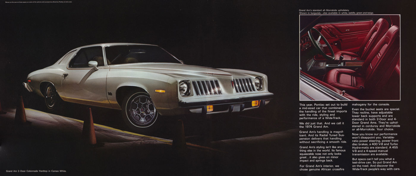 White 1974 Grand Am coupe cornering between traffic cones, with an inset of its burgundy bucket seats and brochure text
