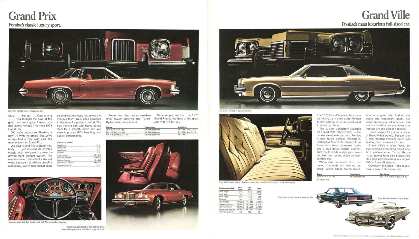 Brochure spread: a red 1973 Grand Prix coupe with its dash and red interior on the left; a gold Grand Ville on the right page