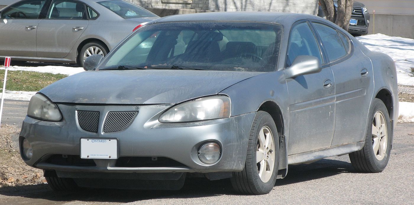 Gray 2008 Grand Prix sedan front three-quarter on a snowy lot
